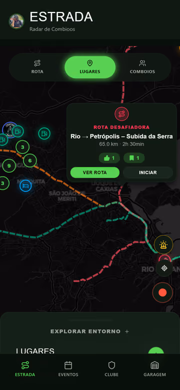 BikerWay road view: a dark map around Rio de Janeiro with colored route lines, place pins and a card for the Rio to Petrópolis challenge route.